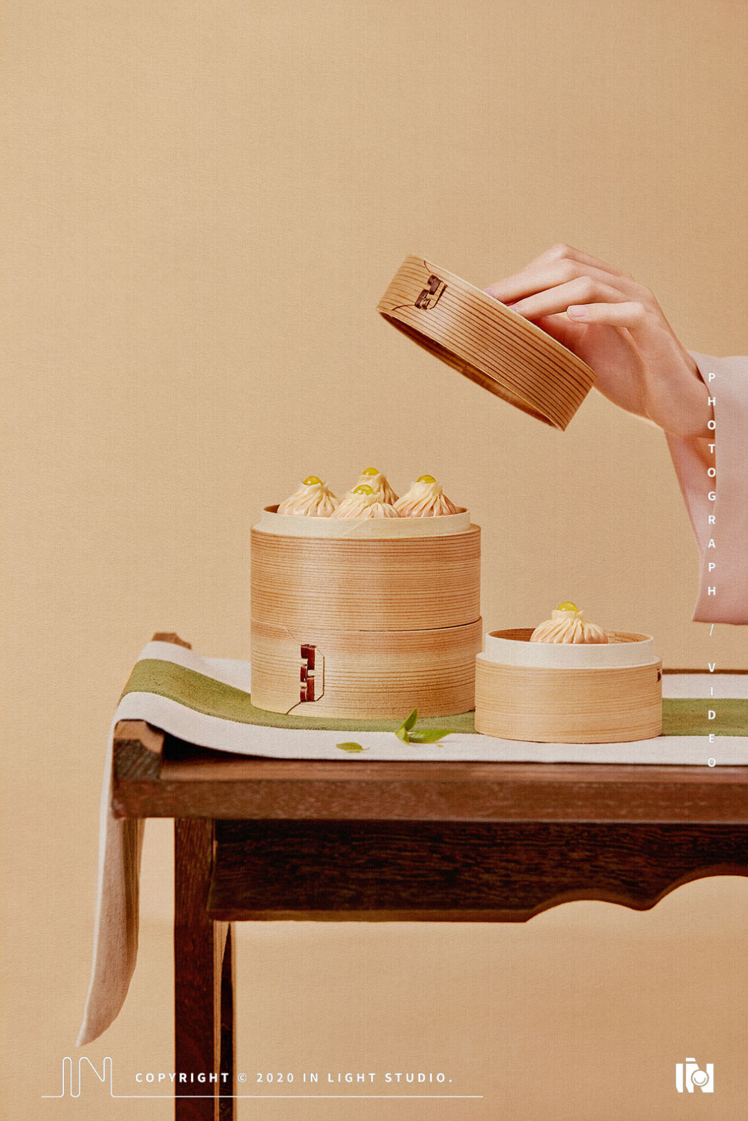 春风酒家70 in light 小笼包拍摄-古田路9号-品牌创意/版权保护平台