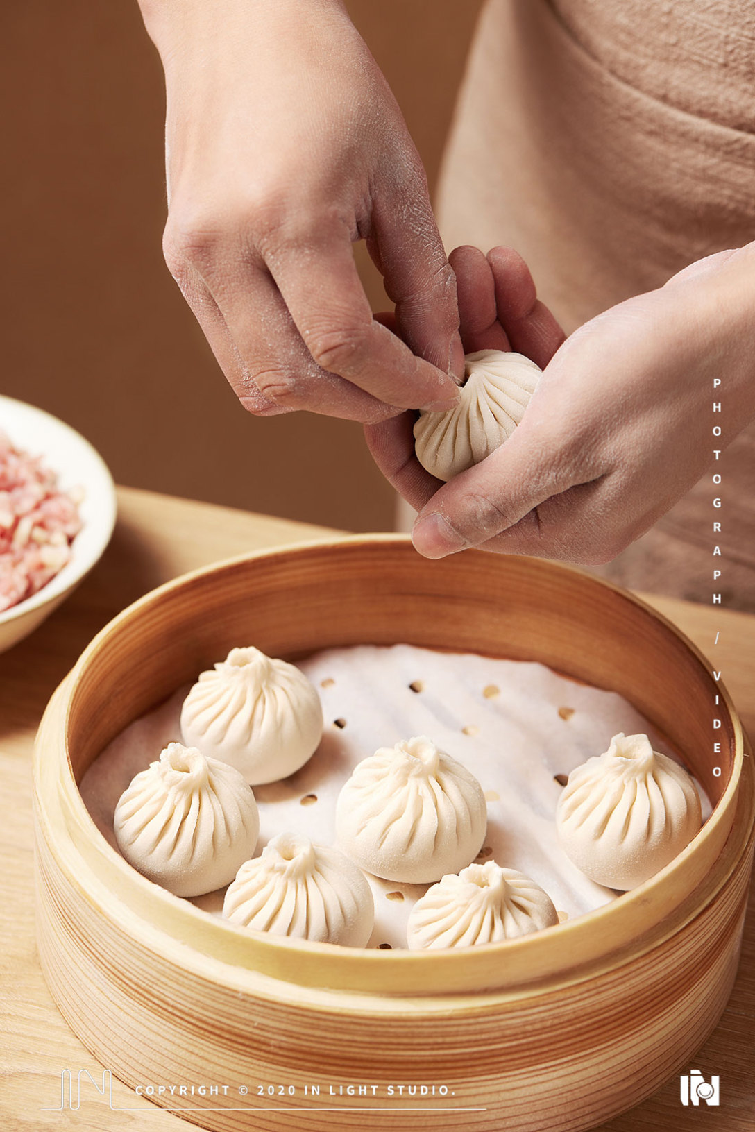 春风酒家70 in light 小笼包拍摄-古田路9号-品牌创意/版权保护平台